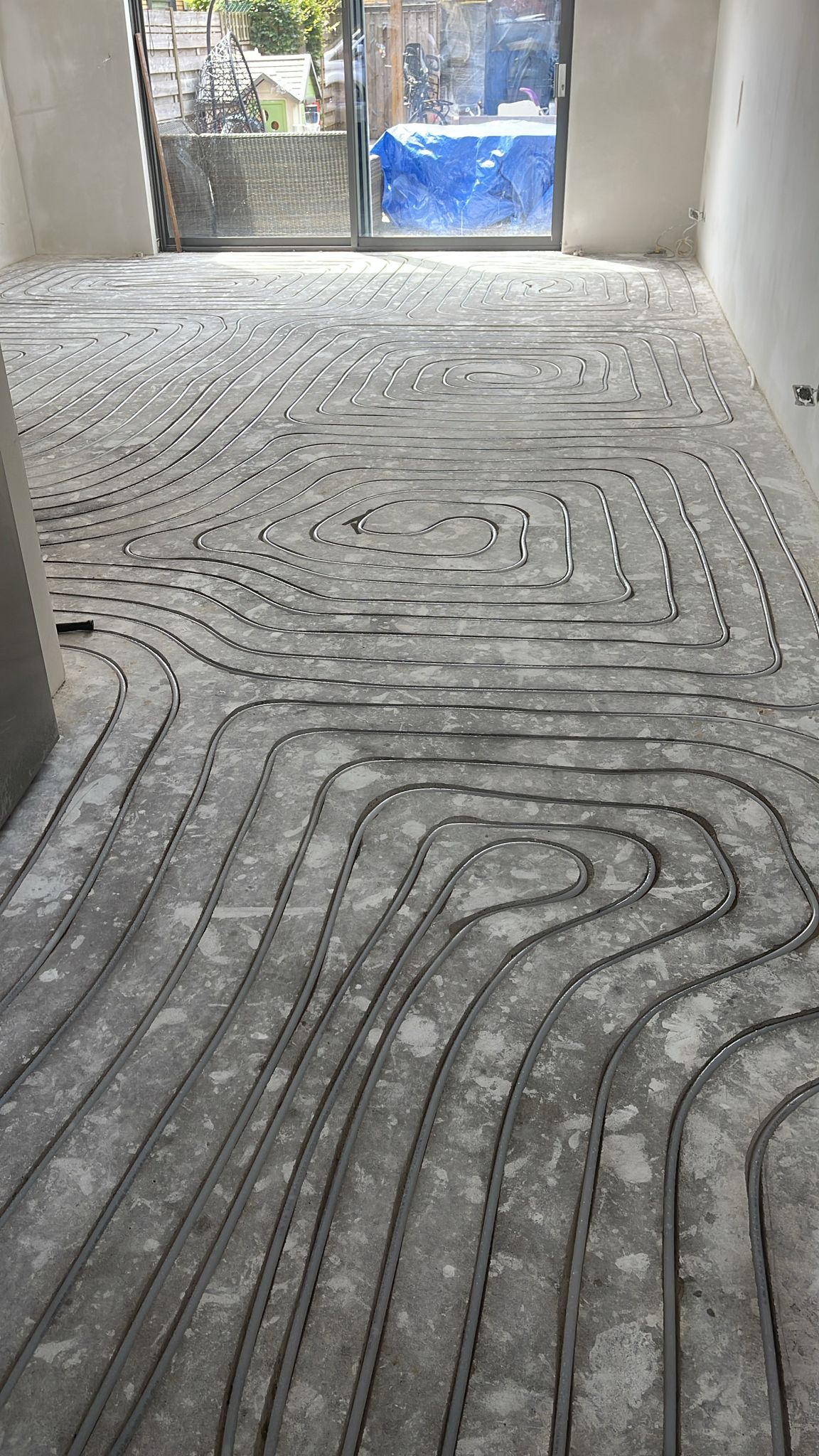 Aanleg vloerverwarming woonkamer Rotterdam